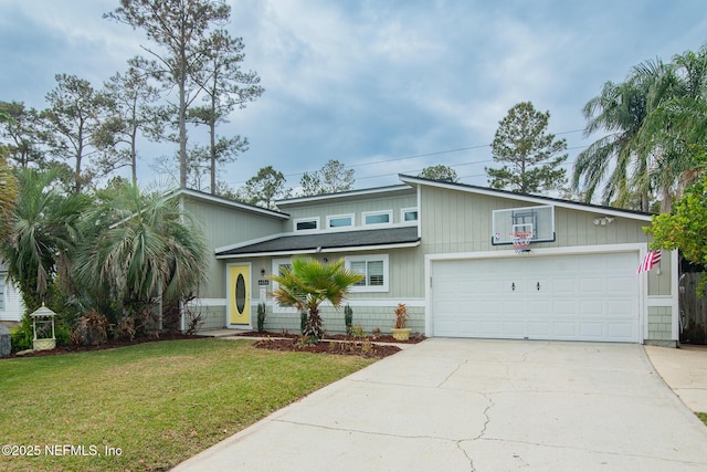 mid-century modern home with a garage, a front yard, roof with shingles, and driveway