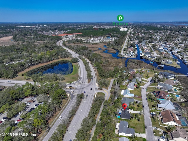 aerial view featuring a water view and a residential view