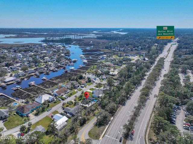 drone / aerial view featuring a water view