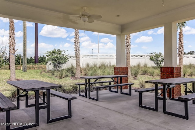 view of home's community featuring a fenced backyard, a patio, and outdoor dining space