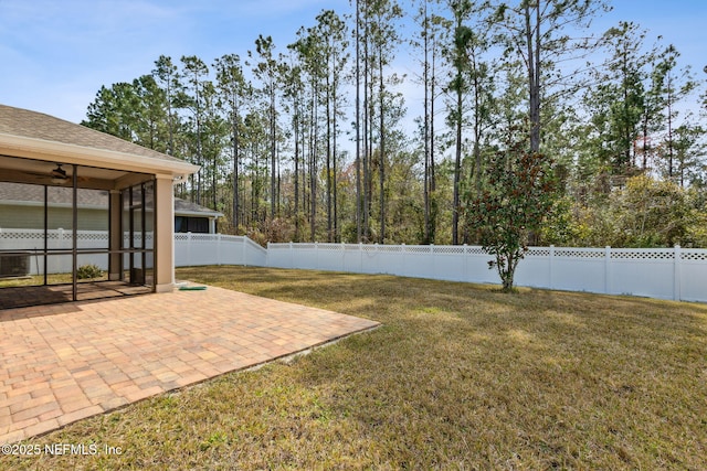 view of yard with a patio area and a fenced backyard