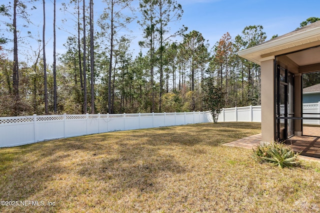 view of yard featuring a fenced backyard