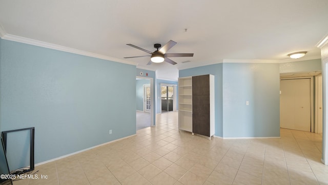 unfurnished room featuring light tile patterned floors, ornamental molding, a ceiling fan, and baseboards