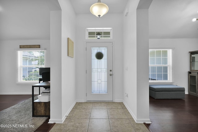 foyer entrance featuring hardwood / wood-style flooring