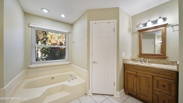 bathroom featuring tile patterned flooring, vanity, recessed lighting, and a bath