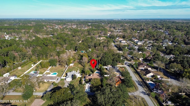 aerial view featuring a forest view