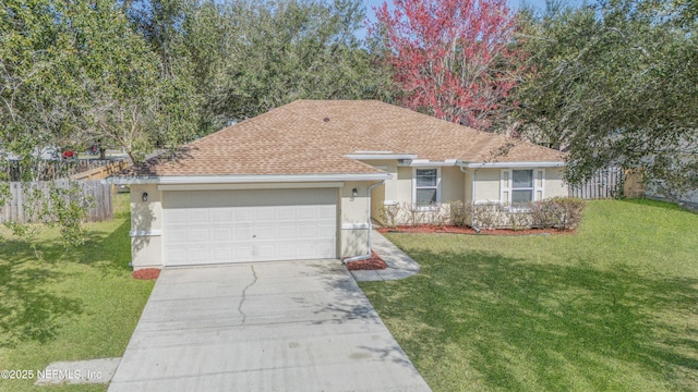 single story home featuring a front lawn and a garage