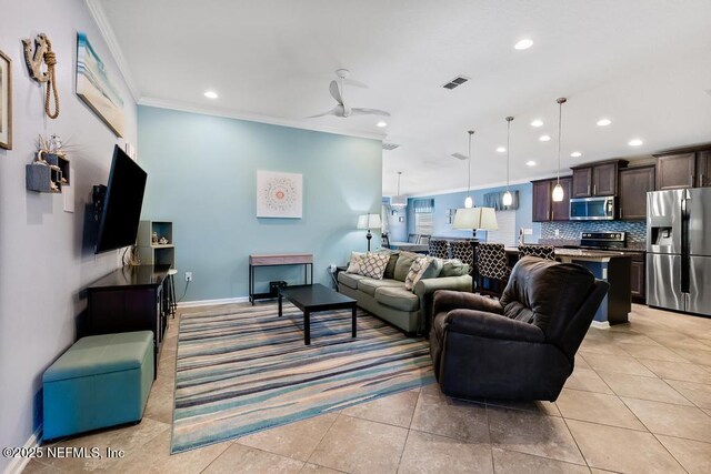 tiled living room with ornamental molding