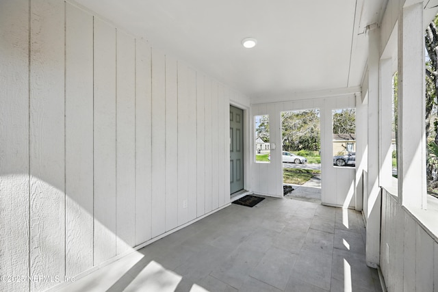 view of unfurnished sunroom