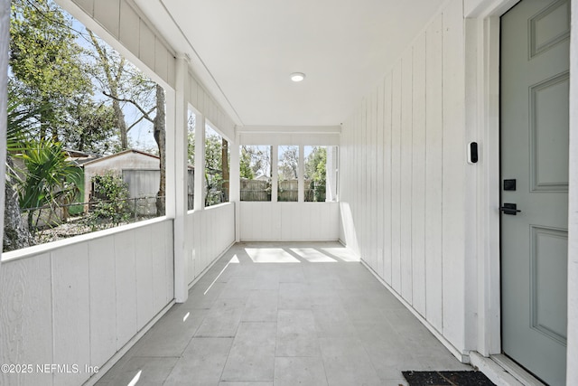 view of unfurnished sunroom