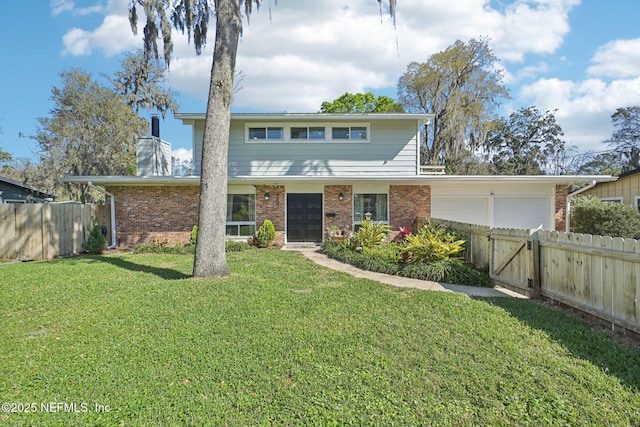 view of front facade featuring a front yard, a chimney, an attached garage, and fence