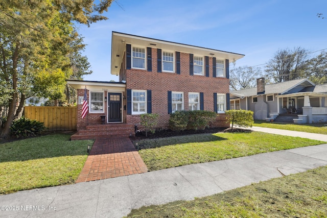 view of front of home with a front lawn