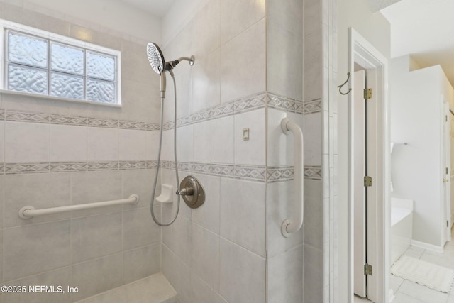 bathroom featuring tiled shower