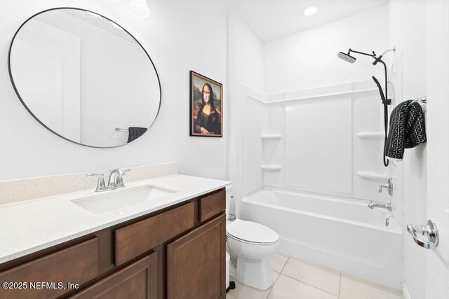 full bathroom featuring tile patterned floors, toilet, vanity, and bathtub / shower combination