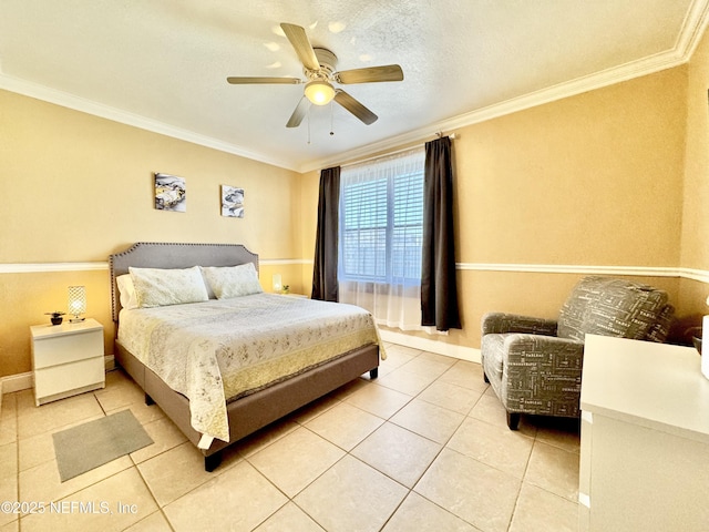 bedroom with ceiling fan, crown molding, and tile patterned flooring