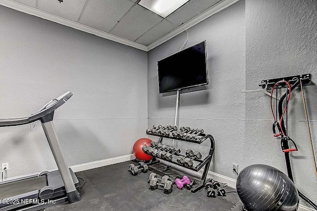 workout room with crown molding