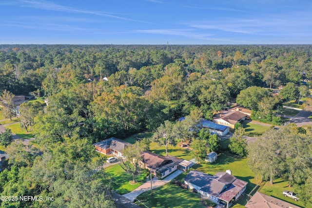 aerial view featuring a forest view