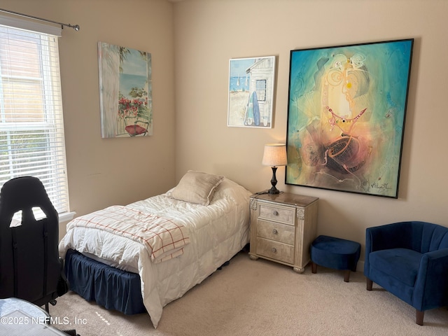 bedroom with light colored carpet