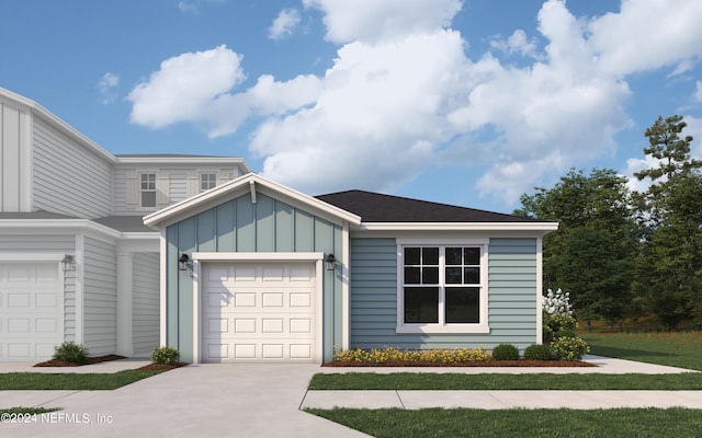 view of front of property featuring board and batten siding, driveway, and a garage