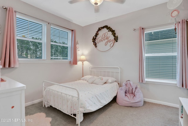 bedroom with carpet floors, ceiling fan, and baseboards