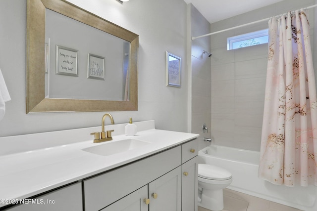 full bath with vanity, toilet, and shower / bath combo with shower curtain