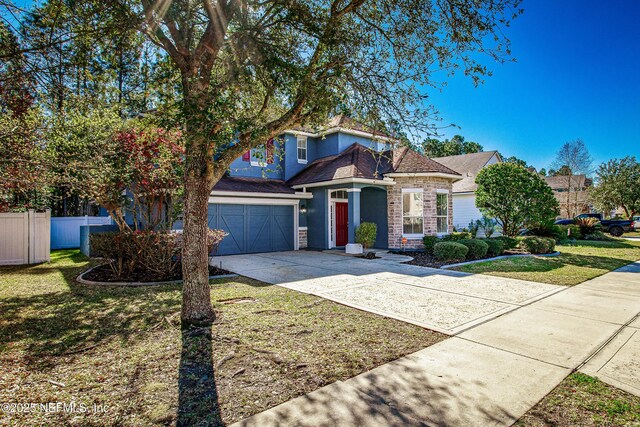 1465 Shadow Creek Dr, Orange Park, FL 32065 - view of front of house featuring a front yard and a garage