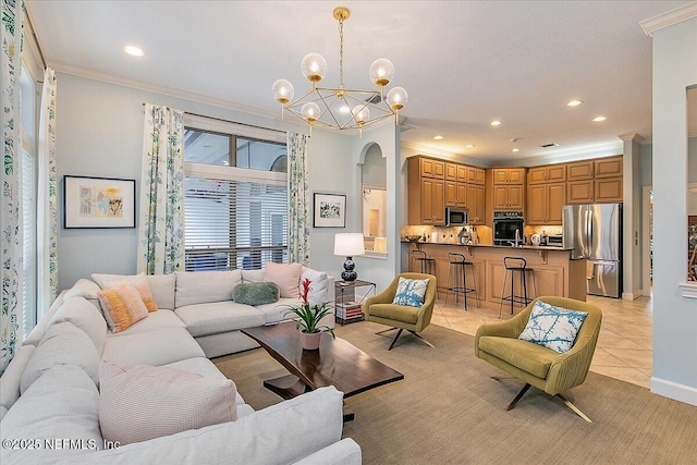 living area with a chandelier, crown molding, arched walkways, recessed lighting, and light tile patterned floors