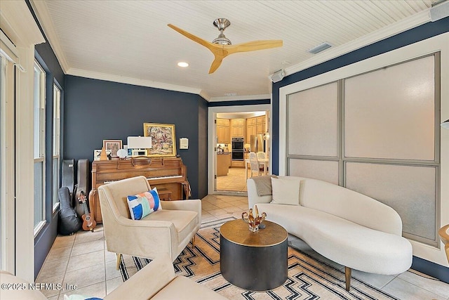 living room featuring crown molding, ceiling fan, light tile patterned flooring, and recessed lighting