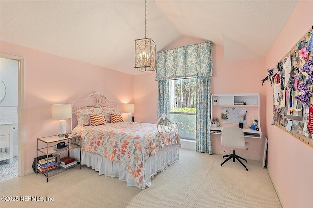 carpeted bedroom with vaulted ceiling, a desk, a chandelier, radiator heating unit, and baseboards