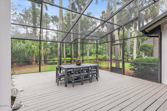 deck with outdoor dining area