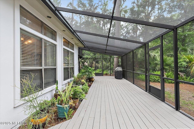 wooden terrace with glass enclosure