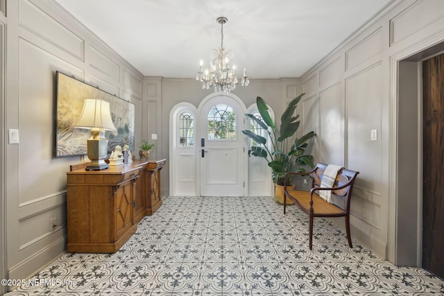 entrance foyer featuring a notable chandelier