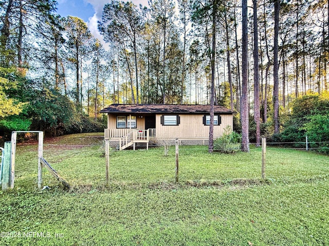 view of front of house with a front yard