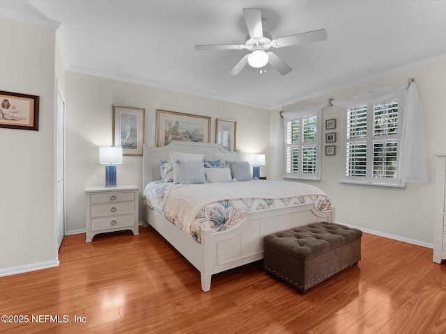 4306 Serena Cir, Saint Augustine, FL 32084 - bedroom with ornamental molding, baseboards, light wood-type flooring, and a ceiling fan