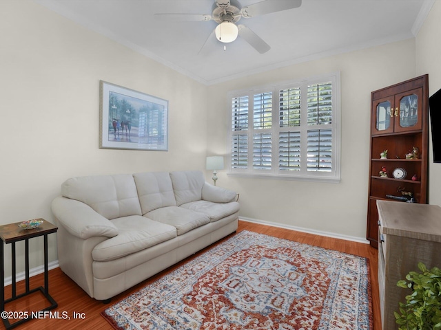 4306 Serena Cir, Saint Augustine, FL 32084 - living area with baseboards, a ceiling fan, crown molding, and wood finished floors