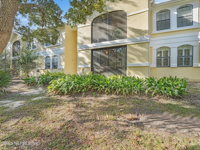 4306 Serena Cir, Saint Augustine, FL 32084 - view of property exterior featuring stucco siding