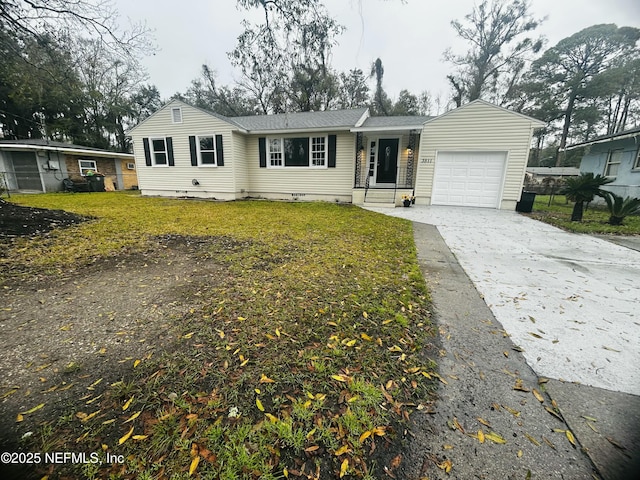 ranch-style home with a front lawn, crawl space, driveway, and an attached garage