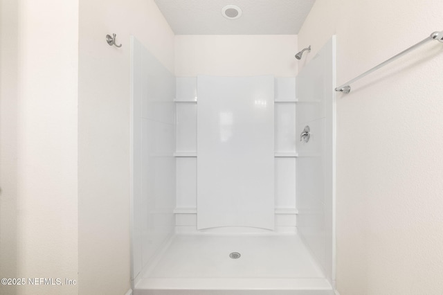 bathroom with walk in shower