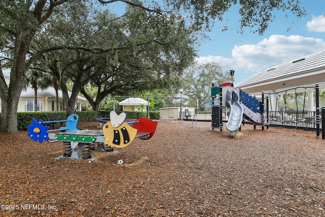 community play area featuring fence