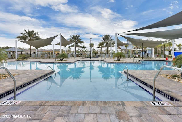 pool featuring a patio area