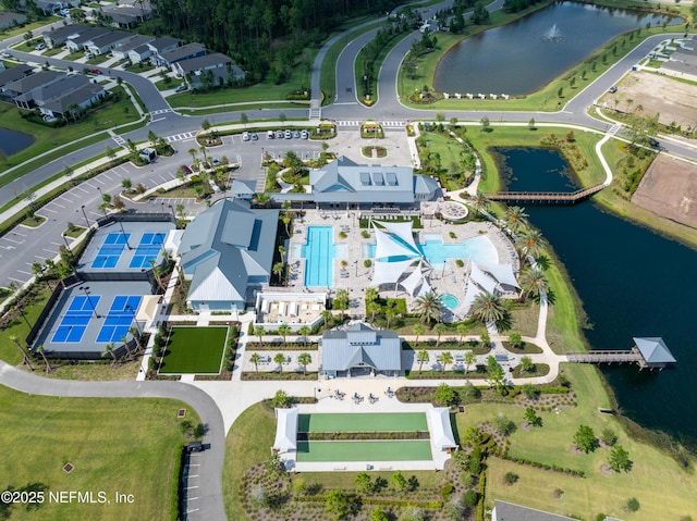 birds eye view of property featuring a water view