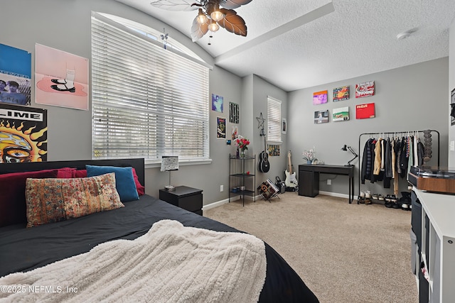 bedroom featuring light colored carpet, vaulted ceiling, a textured ceiling, and baseboards