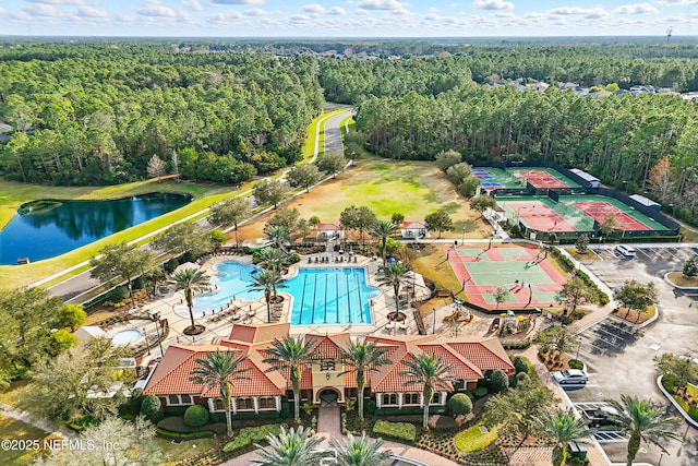 bird's eye view featuring a water view and a view of trees