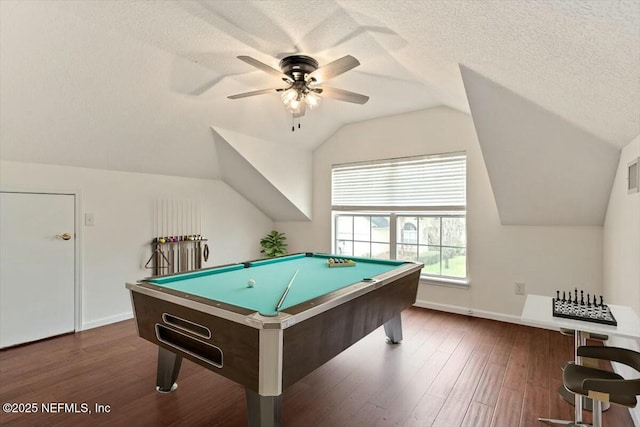 recreation room with pool table, lofted ceiling, a textured ceiling, ceiling fan, and dark hardwood / wood-style floors