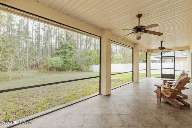 sunroom / solarium with wood ceiling