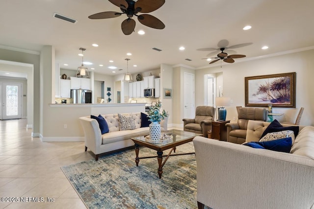 living area with crown molding, recessed lighting, visible vents, light tile patterned flooring, and baseboards