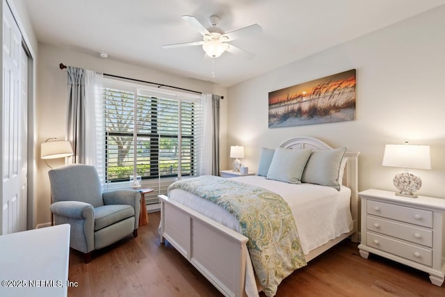 bedroom featuring ceiling fan and wood finished floors