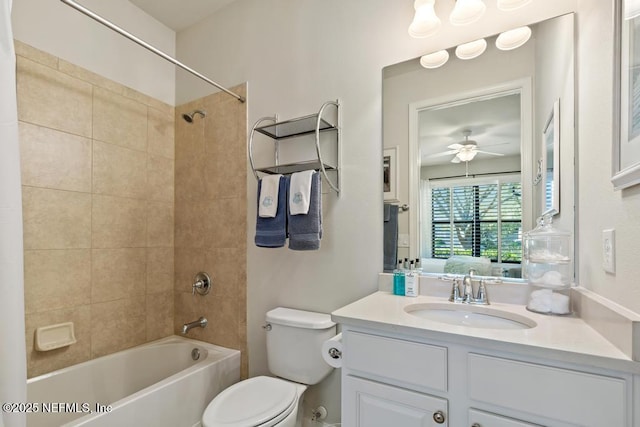 full bath featuring toilet, ceiling fan, shower / bathing tub combination, and vanity