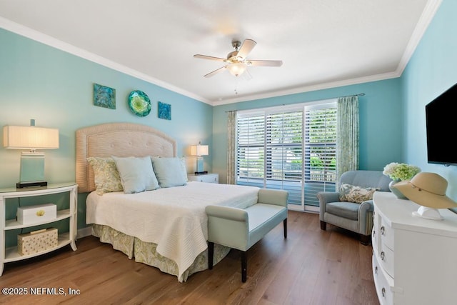 bedroom with ornamental molding, a ceiling fan, and wood finished floors