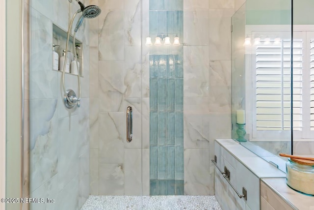 bathroom with a shower stall